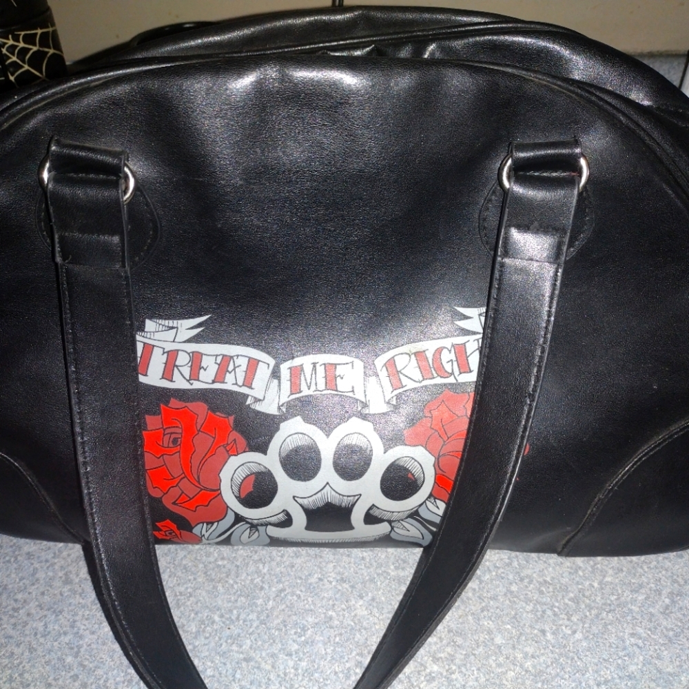 Treat me right. Rock Rebel purse.